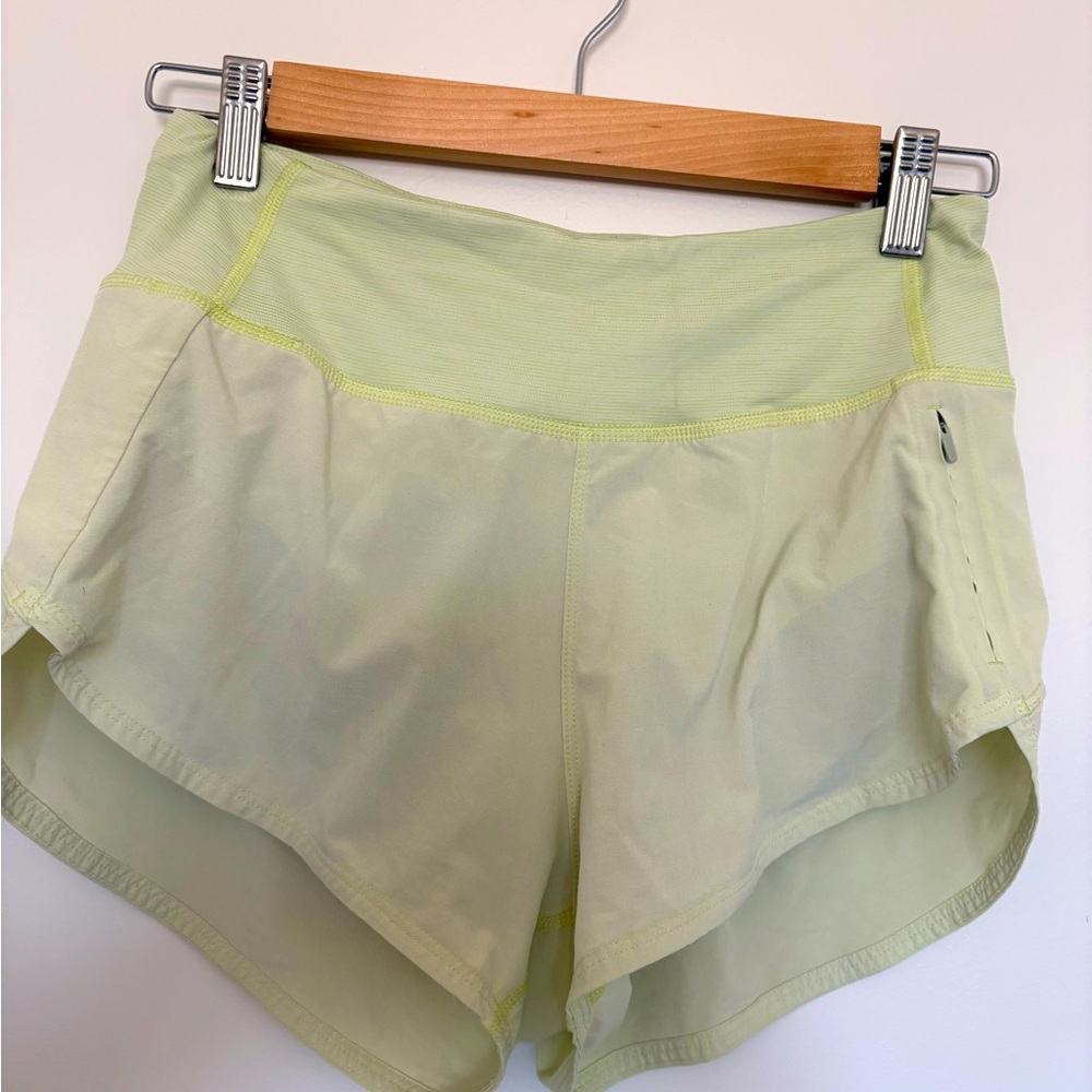 Outdoor voices yellow green small running short